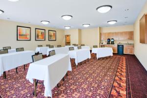 a conference room with white tables and chairs at Holiday Inn Express Hotel & Suites Gillette by IHG in Gillette +51 photos