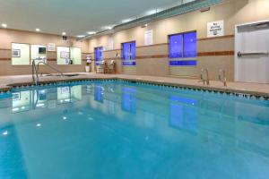 a large swimming pool in a hotel room at Holiday Inn Express Hotels Grants - Milan by IHG in Grants
