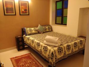 Aura B&B - The Haveli Homestay客房内的一张或多张床位