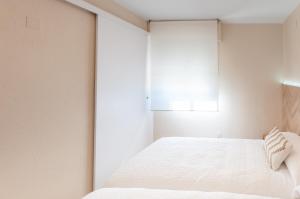Posteľ alebo postele v izbe v ubytovaní AG MANILA PREMIUM