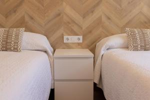 Posteľ alebo postele v izbe v ubytovaní AG MANILA PREMIUM