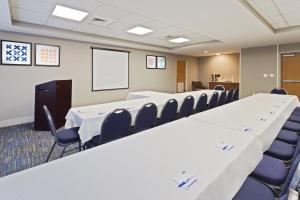a conference room with a long table and chairs at Holiday Inn Express & Suites Tavares by IHG in Tavares +34 photos