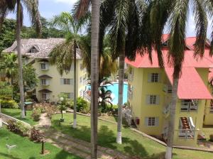 an aerial view of the resort with palm trees at Poolside Mystic Apt 9A in Ocho Rios