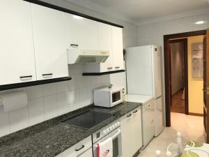 Una cocina o zona de cocina en Apartamento turístico iguazu