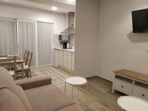 Kuchyň nebo kuchyňský kout v ubytování Apartamentos El Brezu