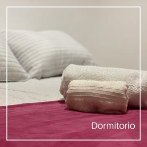 Säng eller sängar i ett rum på Dpto Alquiler Temporario