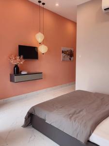 Postel nebo postele na pokoji v ubytování 54 Homestay