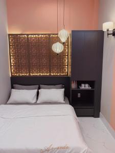 Postel nebo postele na pokoji v ubytování 54 Homestay