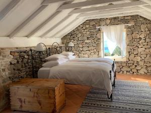 Katil atau katil-katil dalam bilik di Sea View Villa Dvori Sv. Jurja