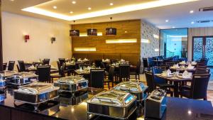 A restaurant or other place to eat at Vareena palace hotel