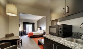 A kitchen or kitchenette at Holiday Inn Express Hotel & Suites Meridian, an IHG Hotel