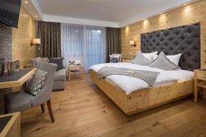 Postel nebo postele na pokoji v ubytování Hotel Weinbauer