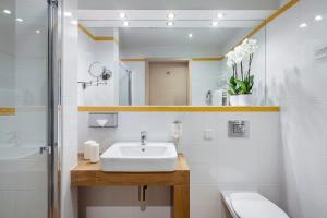 
Ein Badezimmer in der Unterkunft Hotel Arkon Park Business & Sport

