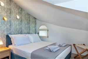 Posteľ alebo postele v izbe v ubytovaní Marina View Sea Front Apartment