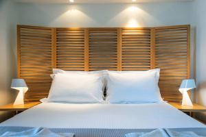 Posteľ alebo postele v izbe v ubytovaní Marina View Sea Front Apartment