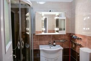 Kúpeľňa v ubytovaní Bálint Apartman - In the heart of Miskolc + 20 fotografií