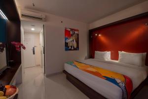 Voodi või voodid majutusasutuse Grand Picasso Hotel toas