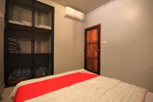 Postel nebo postele na pokoji v ubytování OYO 544 Sleep Sloth Hostel