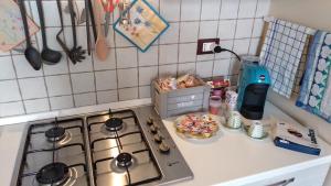 Köök või kööginurk majutusasutuses B&B Vecchia Darsena
