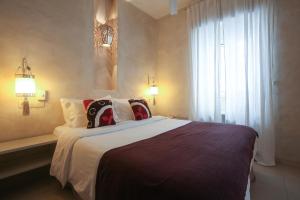 Postel nebo postele na pokoji v ubytování Apartamentos Caravane
