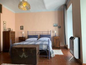 Postel nebo postele na pokoji v ubytování Cascina Alberta