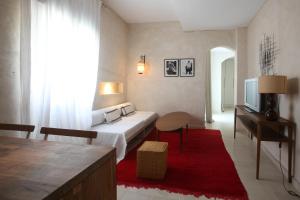 Postel nebo postele na pokoji v ubytování Apartamentos Caravane