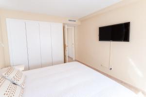 Posteľ alebo postele v izbe v ubytovaní AG MANILA PREMIUM