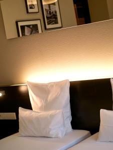 Letto o letti in una camera di Coque Hotel
