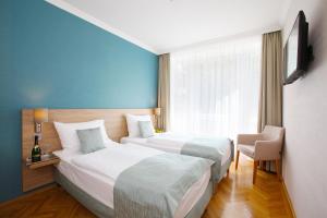 Postel nebo postele na pokoji v ubytování Medos Hotel + 37 fotografií