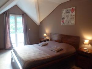 Ліжко або ліжка в номері Chambres d'hôtes DORIS
