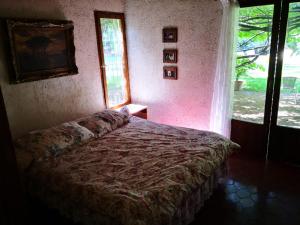 Tempat tidur dalam kamar di Casa Vistalba 220 dolarblue B La Capilla