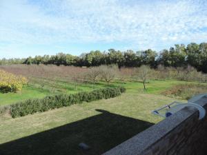 a view of a park from the balcony of a house at Agriturismo i doni del mandorlo in Alghero