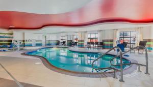 a large swimming pool in a large building at Holiday Inn Express & Suites Eureka by IHG in Eureka