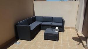 a living room with a couch and a table at Matheo Palomares in Palomares