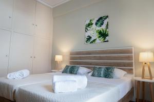 Posteľ alebo postele v izbe v ubytovaní Paradise apartment in Koukaki