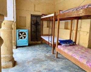 Μία ή περισσότερες κουκέτες σε δωμάτιο στο topaz backpackers