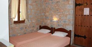 Letto o letti in una camera di Lalloudes Seaside Accommodation
