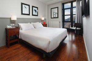 Ένα ή περισσότερα κρεβάτια σε δωμάτιο στο HG Cerler