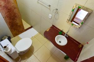 Een badkamer bij Chalés Natora