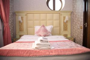 
Кровать или кровати в номере DiliMah Premium Luxury
