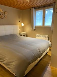Postel nebo postele na pokoji v ubytování Chalet234 in La Boverie