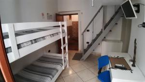 Двухъярусная кровать или двухъярусные кровати в номере Residenza Il Castello