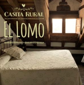 A bed or beds in a room at LA DEHESILLA