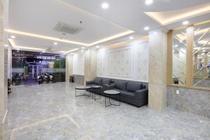 Khu vực ghế ngồi tại XO Hotel & Apartments