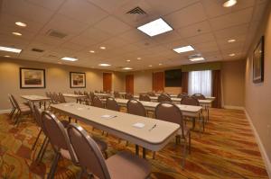 a conference room with tables and chairs in it at Holiday Inn Express & Suites Pine Bluff/Pines Mall by IHG in Pine Bluff +36 photos