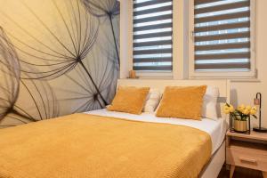 Posteľ alebo postele v izbe v ubytovaní 3D KOSCIUSZKI 19 Apartament