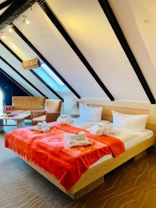 Кровать или кровати в номере Aparthotel Kleine Perle