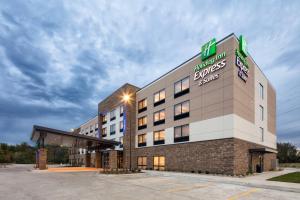 ピオリアにあるHoliday Inn Express East Peoria - Riverfront by IHGのホリデーインエクスプレスホテルの建物正面のレンダリング