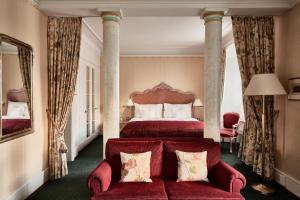 Voodi või voodid majutusasutuse Palais Bad Ragaz toas