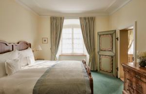 Voodi või voodid majutusasutuse Palais Bad Ragaz toas